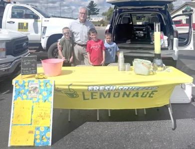 Cousins raise $1,428 for Dickinson foster children
